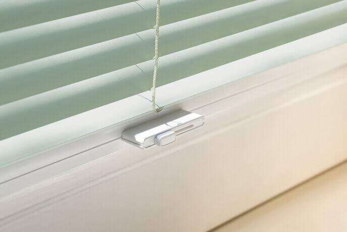 Horizontale jaloezie TruFit tuimel schuifknop